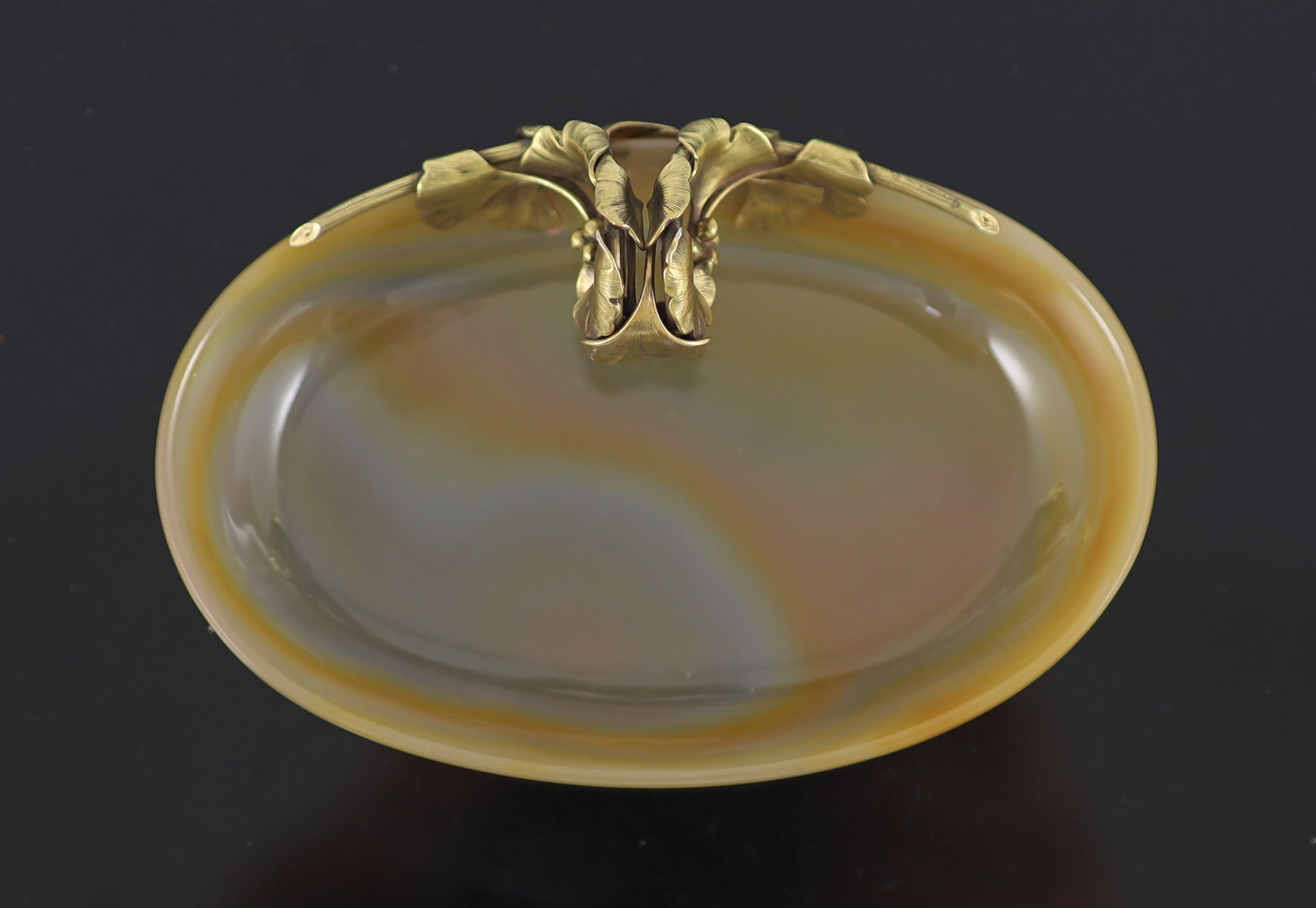 An early 20th century Boucheron silver gilt mounted banded agate oval bowl